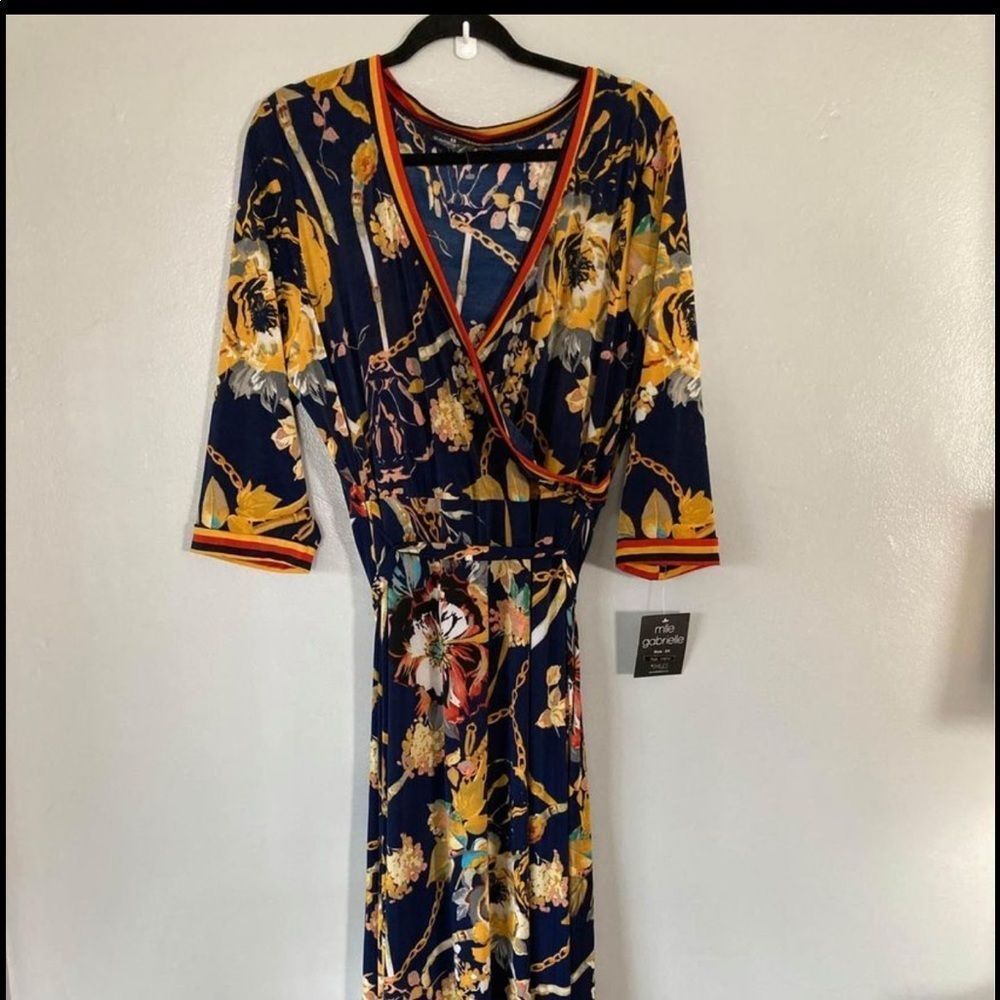 Gorgeous maxi dress. Size 2X. 58” long. Stretchy. Sleek feel. Never worn